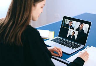 Woman on video call on laptop